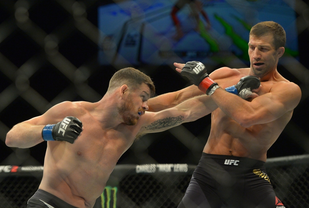 INGLEWOOD CA- JUNE 04 Michael Bisping and Luke Rockhold during their middleweight championship bout at UFC 199 at The Forum