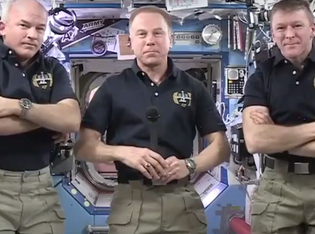 Jeff Willians, Tim Kopra and Tim Peake interacting with Facebook founder Mark Zuckerberg through a Facebook Live chat