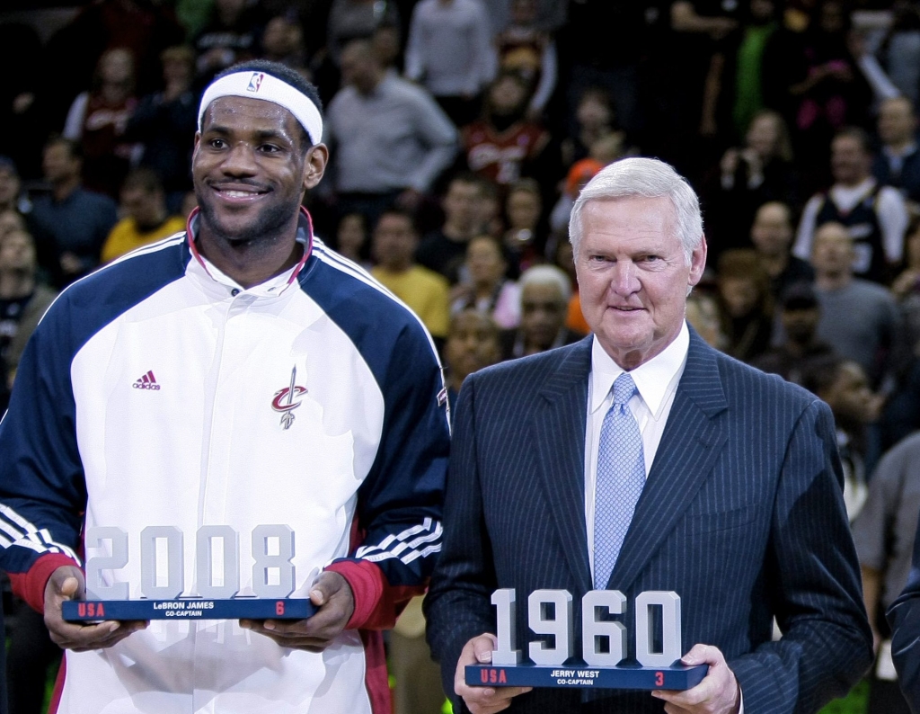 Olympic gold medal basketball co-captains Le Bron James of the Cleveland Cavaliers Jerry West Oscar Robertson and Carmelo Anthony are honored before the Cavaliers play the Denver Nuggets in an NBA basketball game Thursday Feb. 18 2010 in Cleveland