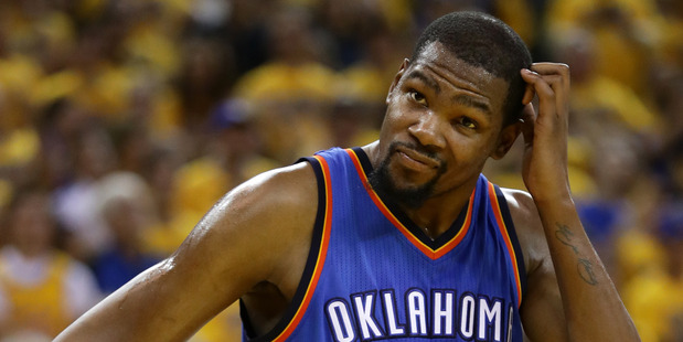 Kevin Durant stands on the court in Game Seven against Golden State