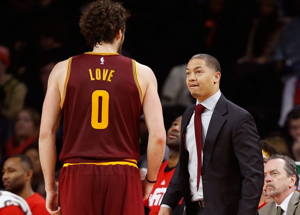 AUBURN HILLS MI- JANUARY 29 Head coach Tyronn Lue of the Cleveland Cavaliers talks with Kevin Love #0 during the first half while playing the Detroit Pistons at the Palace of Auburn Hills