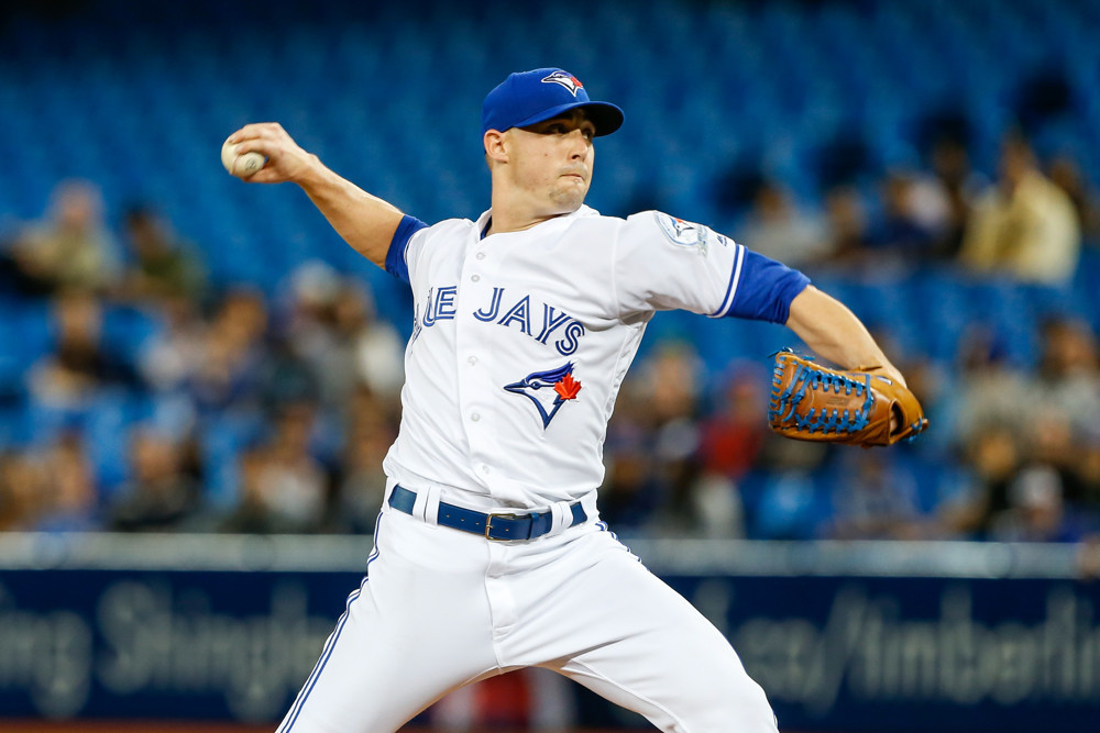 Toronto Blue Jays Pitcher Aaron Sanchez  throws against the Texas Rangers at the Rogers Centre in Toronto Ontario