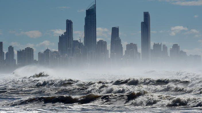 Large waves break at Burleigh heads on the Gold Coast Sunday