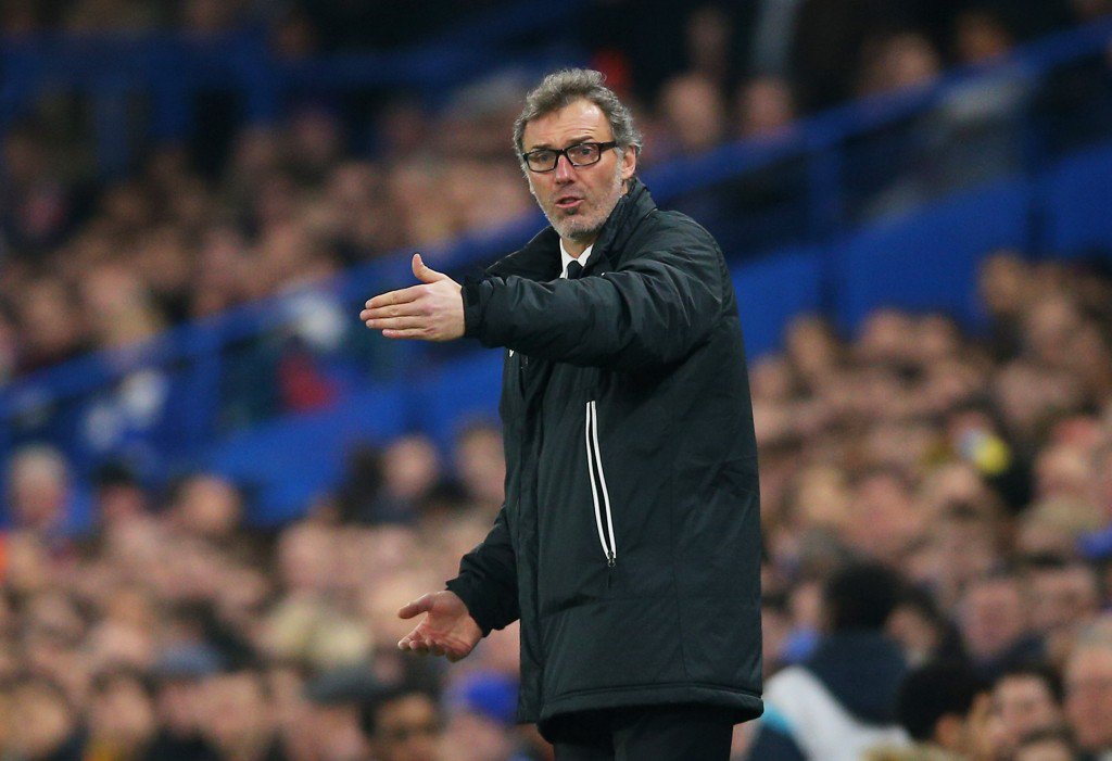 LONDON ENGLAND- MARCH 11 Laurent Blanc the head coach of PSG directs his players during the UEFA Champions League Round of 16 second leg match between Chelsea and Paris Saint Germain at Stamford Bridge