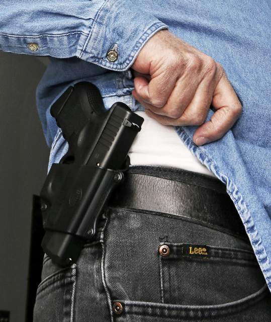 CALIFORNIA: State's strict concealed-gun rules restored by court