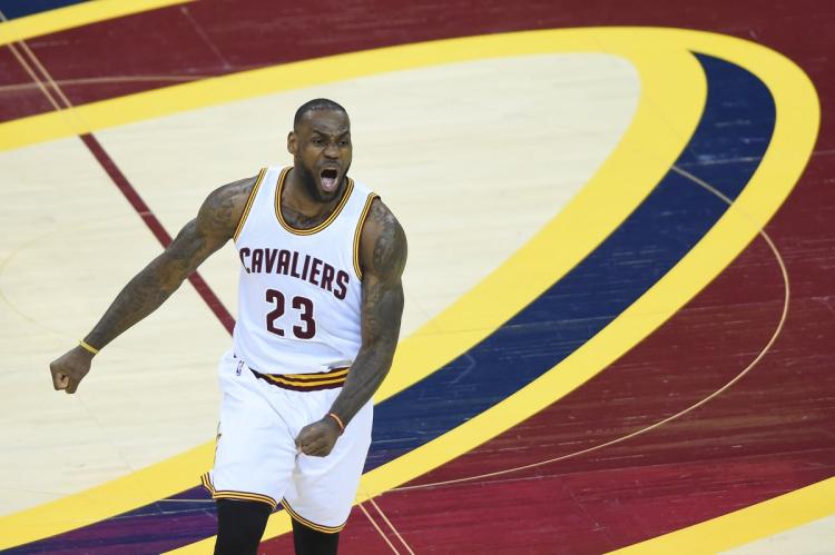 Am amped up Le Bron James lets his play do the talking in Game 3 32 points 11 rebounds and six assists as the Cavs rolls to a win Wednesday to make the NBA Finals 2-1