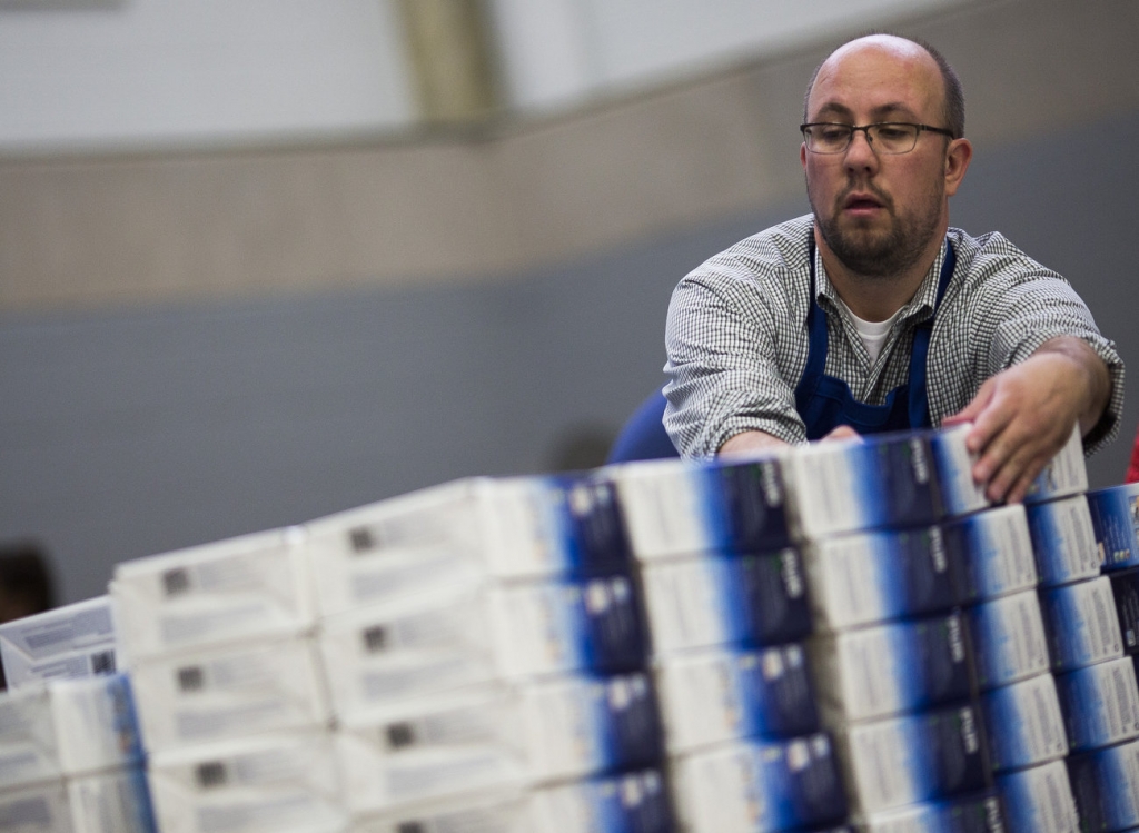 Donated water filters are handed out to Flint residents