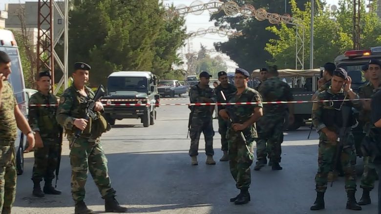 Lebanese army soldiers secure the area near the site where suicide bomb attacks took place in the Christian village of Qaa in the Bekaa valley Lebanon