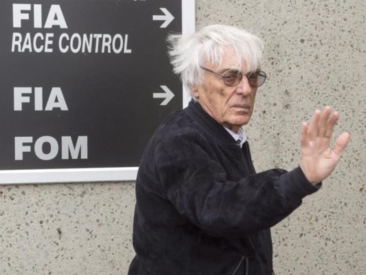 Formula Ones chief executive Bernie Ecclestone waves