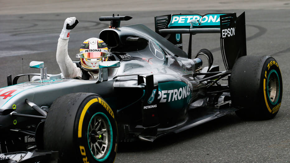 Lewis Hamilton celebrates his victory at Canadian GP