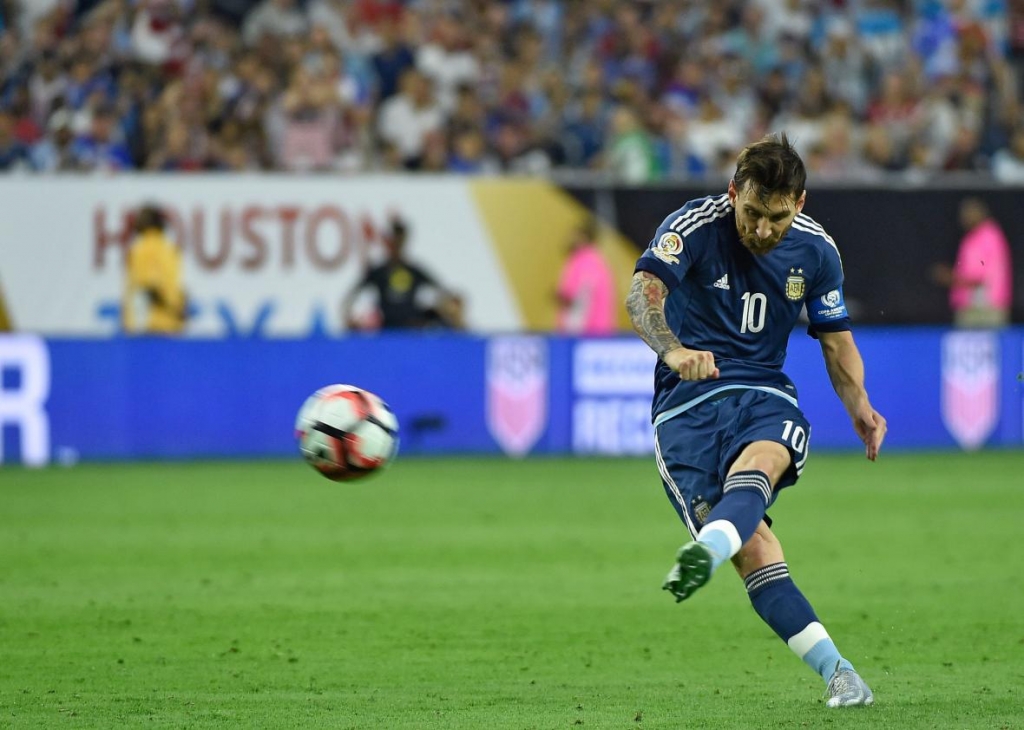 542026792-argentinas-lionel-messi-takes-a-free-kick-to-score