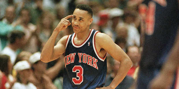 The New York Knicks John Starks puts his finger to his head after losing possession of the ball late in the fourth quarter of Game 6 of the NBA Finals Sunday