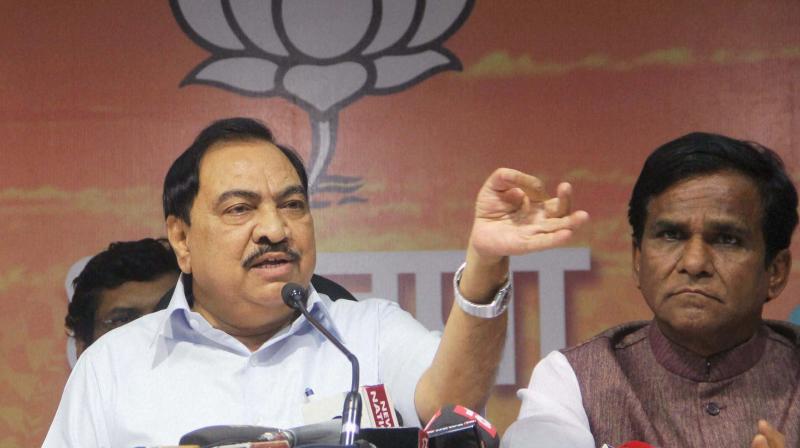 Maharashtra Revenue Minister Eknath Khadse addressing to media after resigning following allegations of impropriety in land deal at BJP office in Mumbai