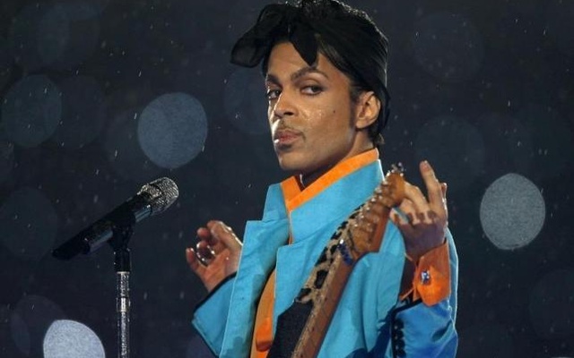 Prince performs during the halftime show of the NFL's Super Bowl XLI football game between the Chicago Bears and the Indianapolis Colts in Miami Florida