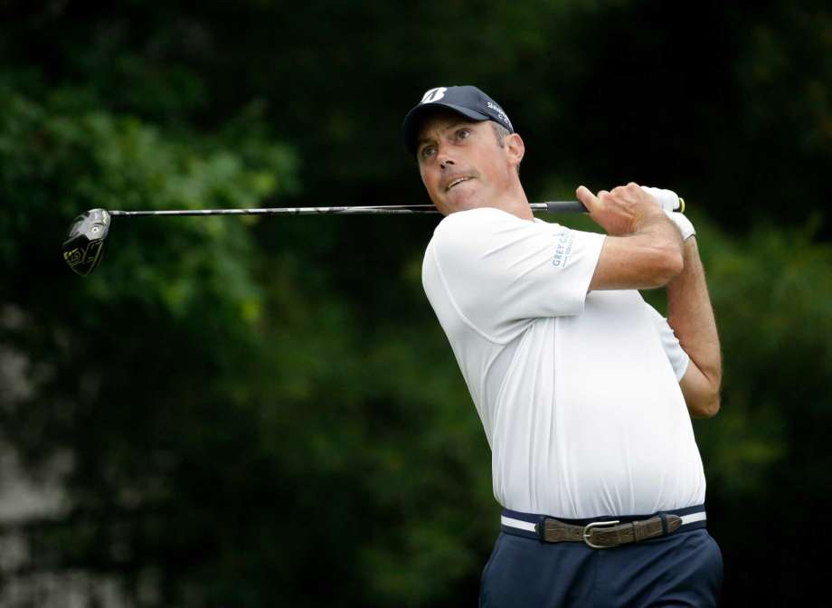 Matt Kuchar watches his drive on the 17th hole during the third round of the Memorial golf tournament Saturday