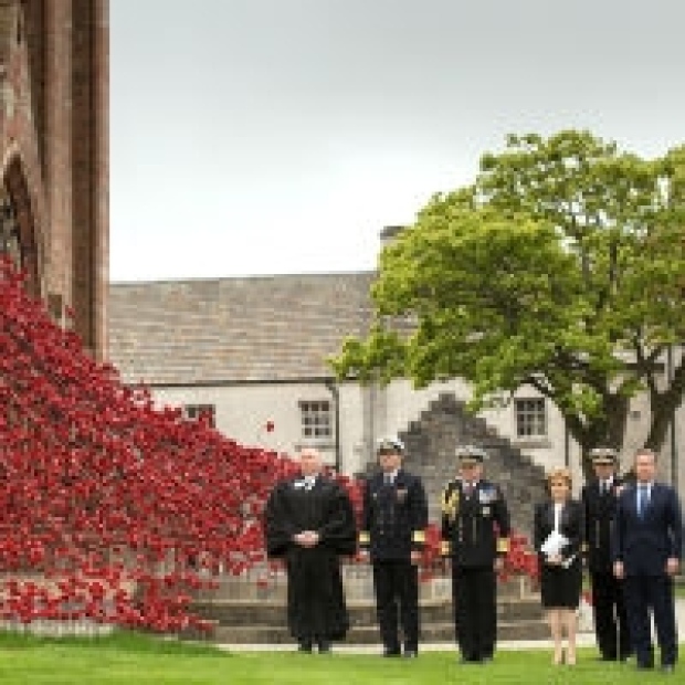 Member of the armed forces rehearse outside St Magnus Cathedral ahead of the service