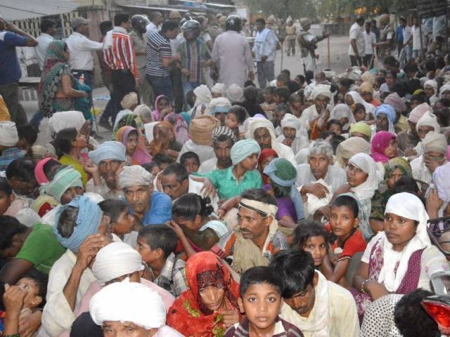 Members of a sect said to have been living illegally after they were evicted from the Jawahar Bagh park in Mathura