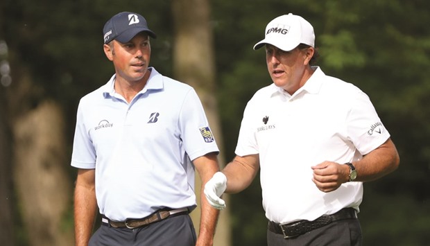 Matt Kuchar takes share of Memorial lead as Rory McIlroy moves up the field