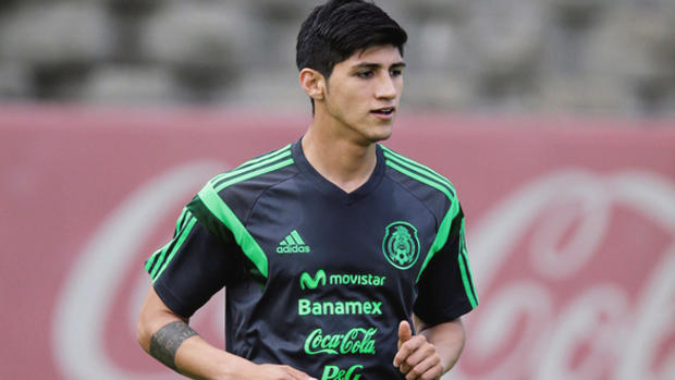 Mexico's striker Alan Pulido runs during a practice session in Mexico City