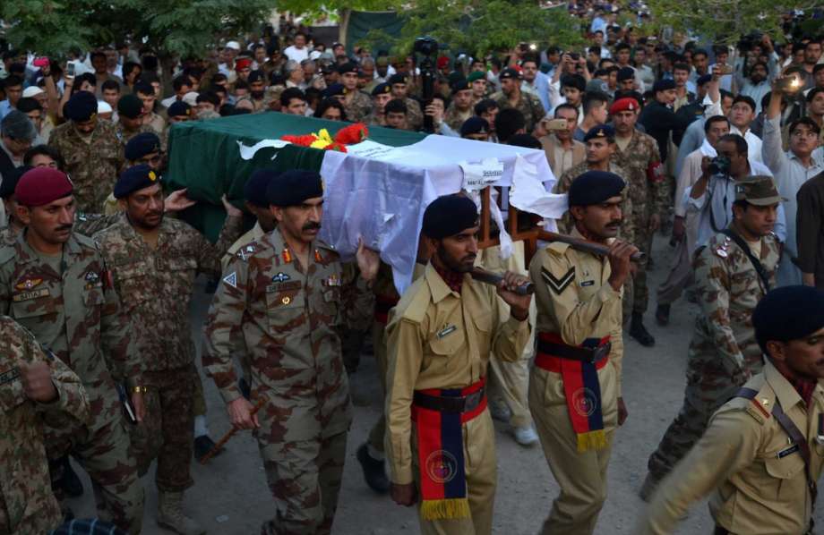 Pakistan army soldiers attend funeral of their colleague who lost his live during clashes with Afghan troops at Pakistan Afghanistan border post Torkham in Quetta Pakistan Tuesday