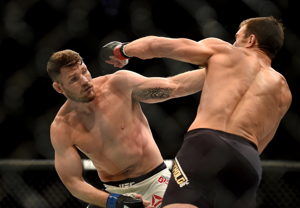 Michael Bisping left fights Luke Rockhold during a UFC 199 at the Forum in Inglewood Calif. Saturday