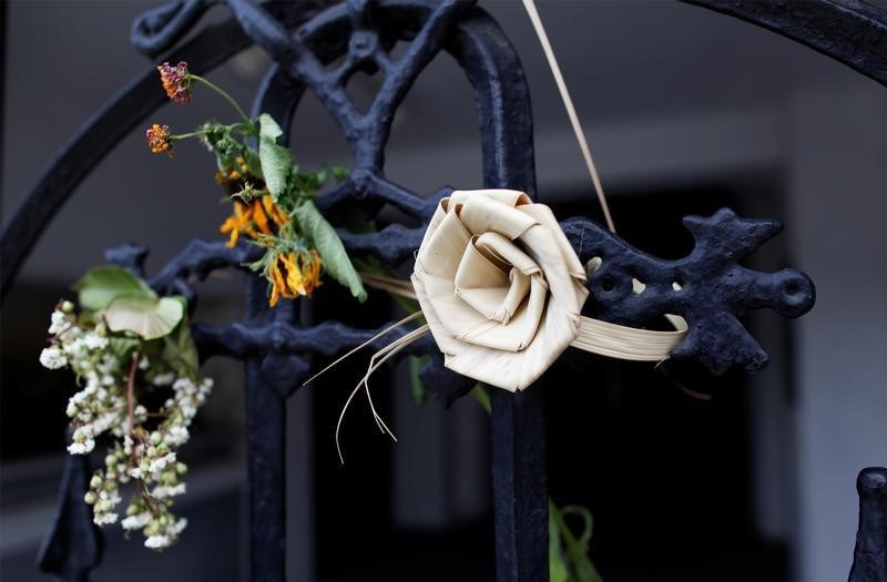 A palmetto rose is tied to the entrance way at Emanuel African Methodist Episcopal Church in Charleston South Carolina