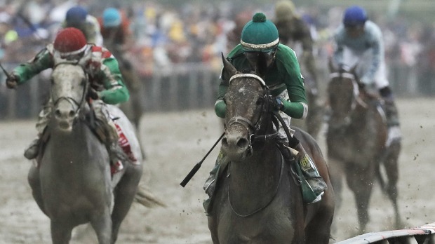 Mud in their eye Kent Desormeaux rides Exaggerator to win the Preakness Stakes at Pimlico Race Course on Saturday