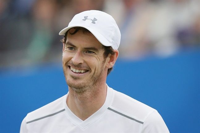 Britain's Andy Murray smiles as he plays Croatia's Marin Cilic during their semifinal tennis match on the sixth day of the Queen's Championships London England Saturday