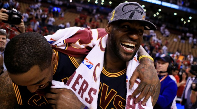 TORONTO ON- MAY 27 Le Bron James #23 and J.R. Smith #5 of the Cleveland Cavaliers celebrate their 113 to 87 win over the Toronto Raptors in game six of the Eastern Conference Finals during the 2016 NBA Playoffs at Air Canada Centre