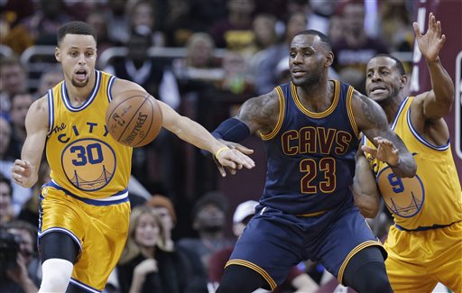 Golden State Warriors Stephen Curry knocks the ball loose from Cleveland Cavaliers&#039 Le Bron James duriing the first half of an NBA basketball game in Cleveland. James knows there's no stopping