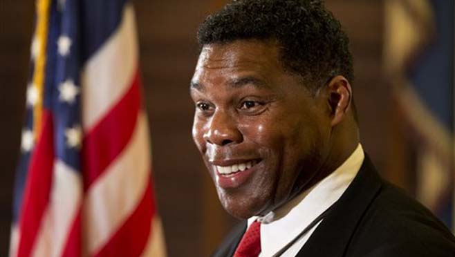 Mixed martial artist and the 1982 Heisman Trophy winner Herschel Walker speaks during a news conference in support of Mix Martial Arts fighter safety research Tuesday