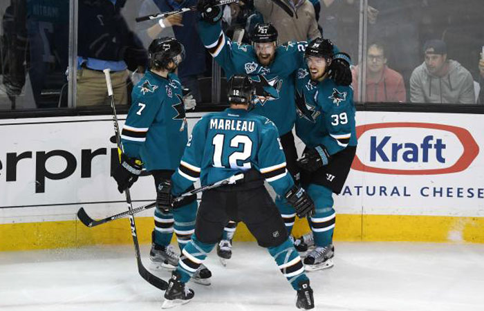 Joonas Donskoi of the San Jose Sharks celebrates his goal with teammates Paul Martin, Patrick Marleau and Logan Couture in Game 6 of the Western Conference finald against the St. Louis Blues at SAP Center in San Jose California