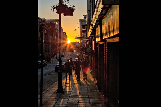 Newhall Street was among the roads perfectly positioned for the Summer Solstice sunset in Birmingham on Sunday June 21. Pic by Tim Cornbill