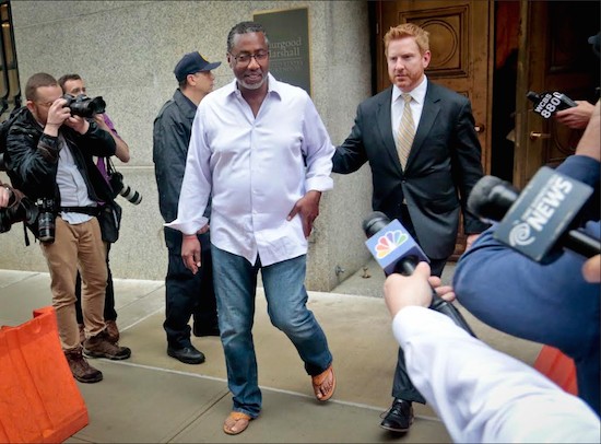 Norman Seabrook center president of the 9,000-member New York City Correction Officers&#039 Benevolent Association is escorted from court on Wednesday in New York. AP