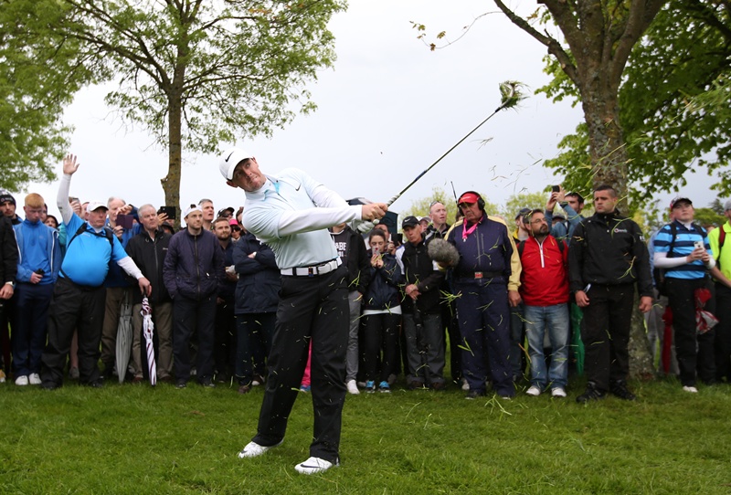 Northern Ireland's Rory Mc Ilroy plays his second shot at the 11th hole during the third round