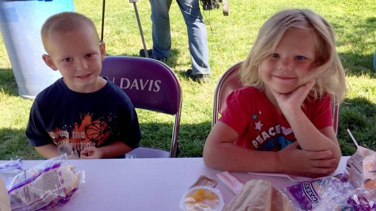 On Indianapolis’s westside a rehabbed school bus brings meals to new summer food program sites