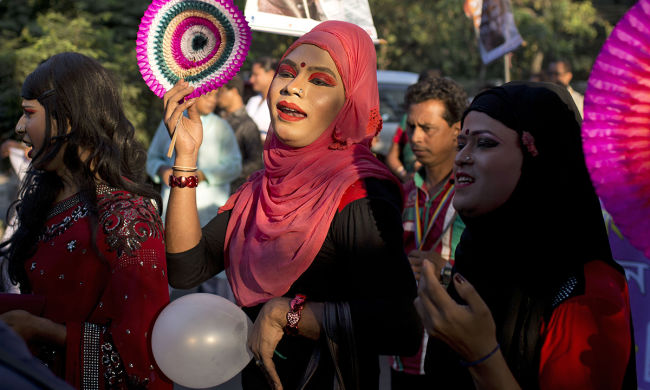 Members of Bangladesh's transgender community and their supporters participate in a pride rally to mark one year since the government recognized them as a third gender in Dhaka Bangladesh Monday Nov. 10 2014