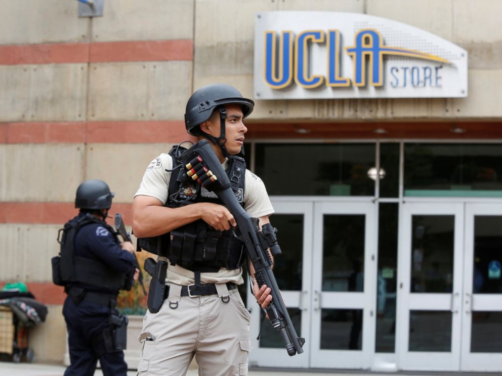 Metro Police officer stands watch on the University of California Los Angeles campus after it was placed on lockdown following reports of a shooter in Los Angeles California