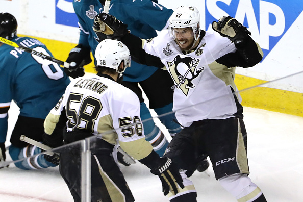 SAN JOSE CA- JUNE 12 Kris Letang #58 of the Pittsburgh Penguins celebrates his goal in the second period with Sidney Crosby #87 in Game Six of the 2016 NHL Stanley Cup Final at SAP Center