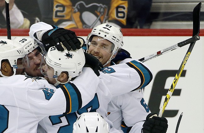 The Latest: Penguins, Sharks scoreless after 1st period