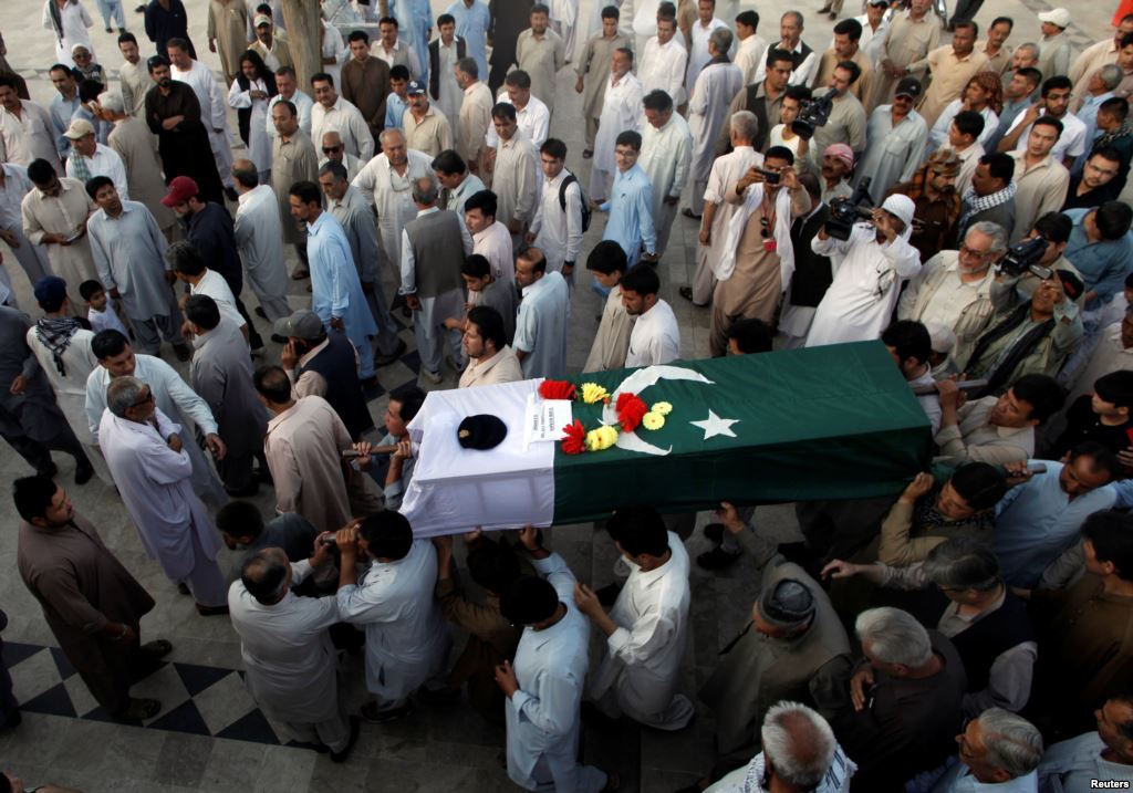 People attend the funeral in Quetta for Pakistani Major Jawad Changezi who was killed during cross border fighting with Afghanistan