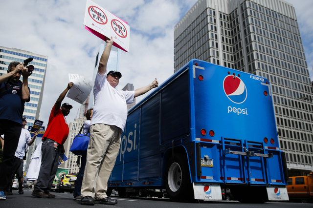 ASSOCIATED PRESS           Opponents of a proposed sugary drink tax demonstrated outside City Hall in Philadelphia on June 8. Philadelphia today became the first major American city with a soda tax despite a multimillion-dollar campa