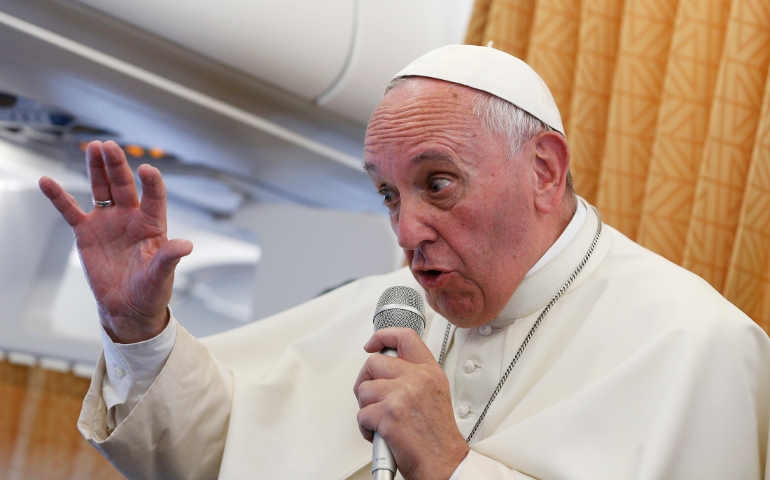 Pope Francis answers questions from journalists aboard his flight from Yerevan Armenia to Rome June 26