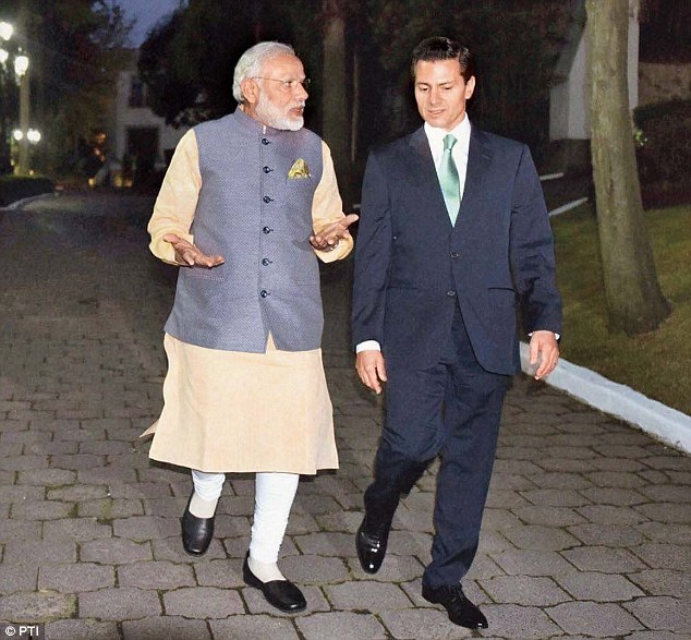 Prime Minister Narendra Modi talks with Mexican President Enrique Pena Nieto as India continues to seek entry into the Nuclear Suppliers Group