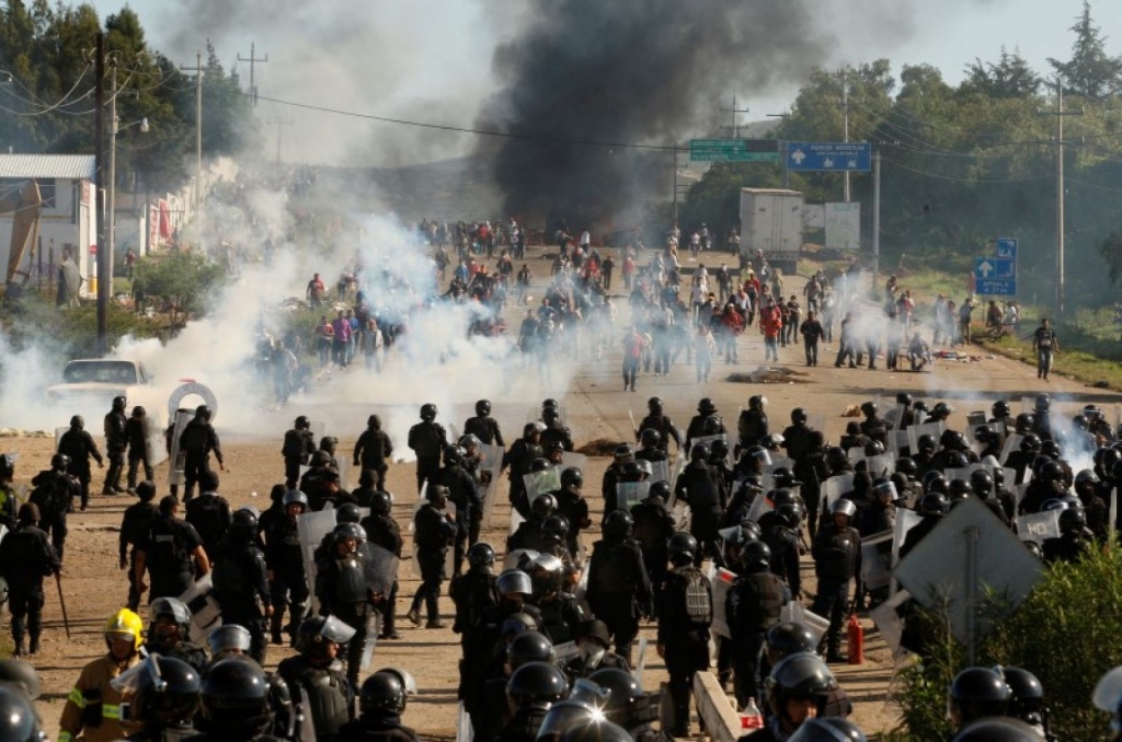 Mexico teacher protests buffet ruling party eight killed in clashes