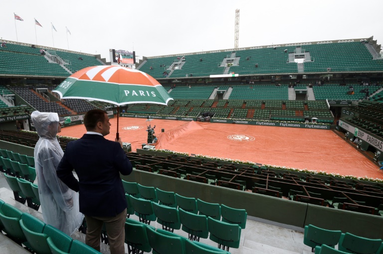 AFP  File  Eric Feferberg The French Open suffered its first washout in 16 years as play was abandoned