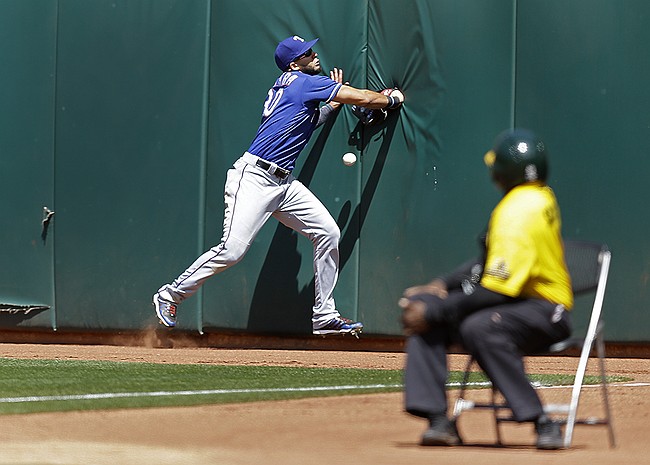 A's deny perfection to a dominant Colby Lewis