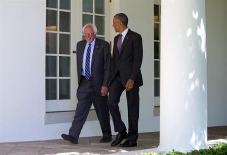 President Barack Obama walks with Democratic presidential candidate Sen. Bernie Sanders I-Vt. down the Colonnade of the White House in Washington Thursday