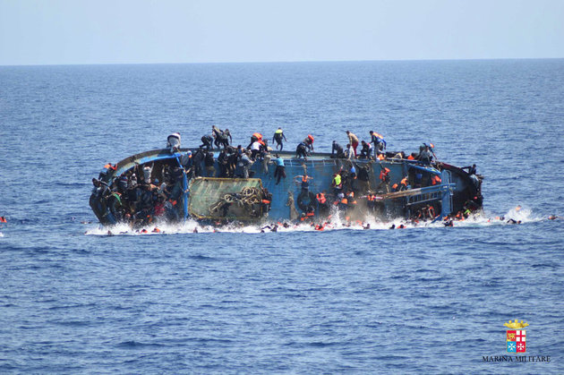 550 migrants cling on for dear life as boat topples over in Mediterranean