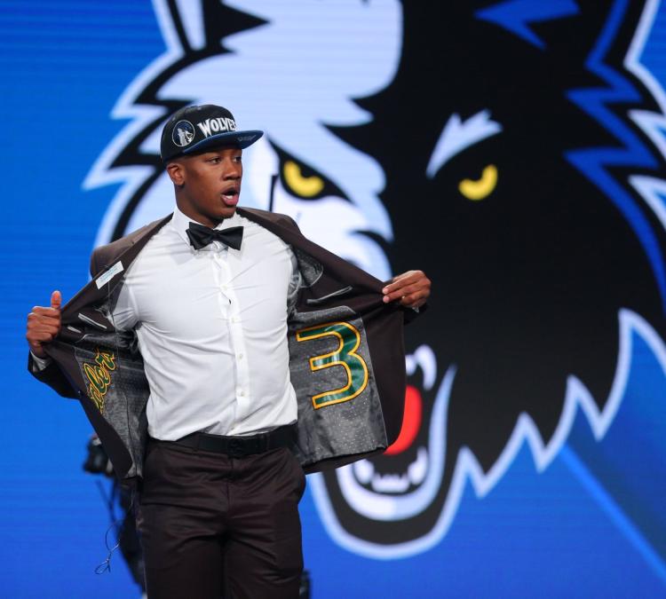 Kris Dunn represents his high school team the New London Whalers and shows off his No. 3 which he’ll reportedly keep in Minnesota